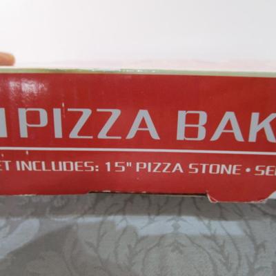 Sale Photo Thumbnail #590: New in box, 15" pizza stone, serving rack, pizza cutter