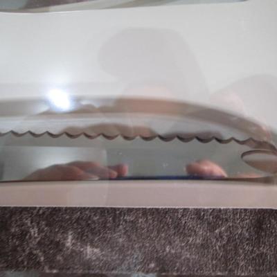 Sale Photo Thumbnail #595: New in box, Ginsu, blade is 7.25"