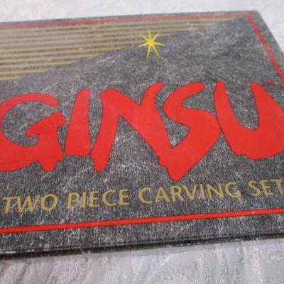 Sale Photo Thumbnail #594: New in box, Ginsu, blade is 7.25"
