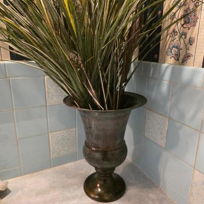 Brass vase with foliage