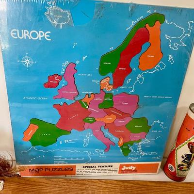 Sale Photo Thumbnail #639: Includes:
Map of Europe
Board games
Satu Paja (Finland) wooden hobby horse
Wooden diplodocus