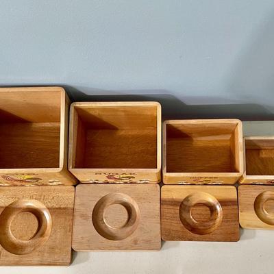 Sale Photo Thumbnail #1406: Includes set of 4 wooden nesting by Norcrest, a rooster spice rack and wooden hamburger press.
