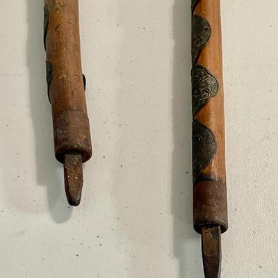 Sale Photo Thumbnail #1547: Each walking stick has a bunch of badges.