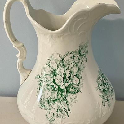 Sale Photo Thumbnail #1666: Ewer has repaired handle.