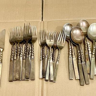 Sale Photo Thumbnail #1973: Includes 7 dinner knives, 8 dinner forks, 8 salad forks, 8 soup spoons & 8 teaspoons.