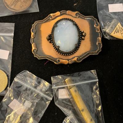 Sale Photo Thumbnail #21: Belt Buckles, Collectors items, Vintage Badges and more.