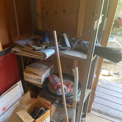 Sale Photo Thumbnail #171: Yard tools, fan, ladder, tiller, chair, hydraulic jack
Shelf does sale