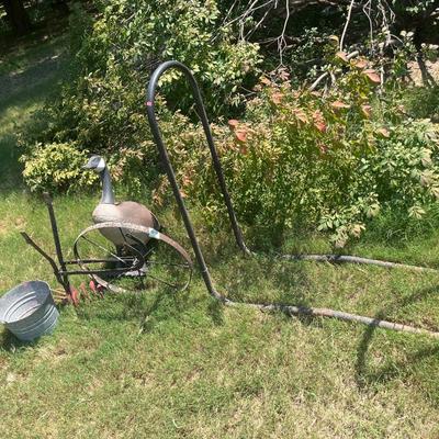 Sale Photo Thumbnail #190: Log rack, yard goose, pail, vintage push plow