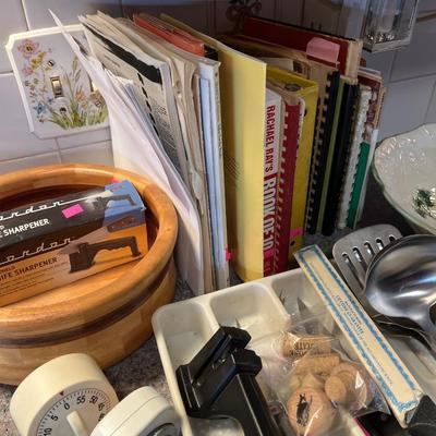 Sale Photo Thumbnail #243: Cookbooks, Knives, wood  and glass bowl.
