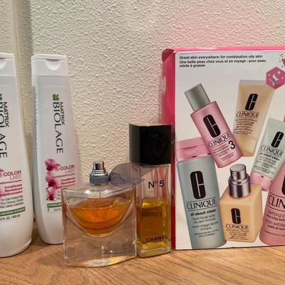 Hair care, perfume, and Clinique face #3 cleaners