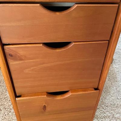 Small chest of organizing drawers