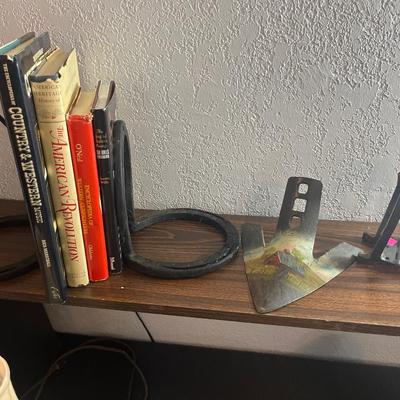 Sale Photo Thumbnail #284: Bookends, book, yearbooks, vintage lights
Table, trash cans and shelf do not sale