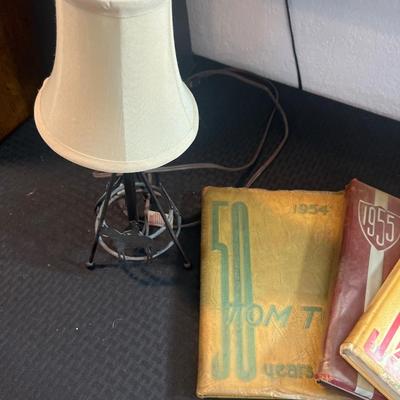 Sale Photo Thumbnail #283: Bookends, book, yearbooks, vintage lights
Table, trash cans and shelf do not sale