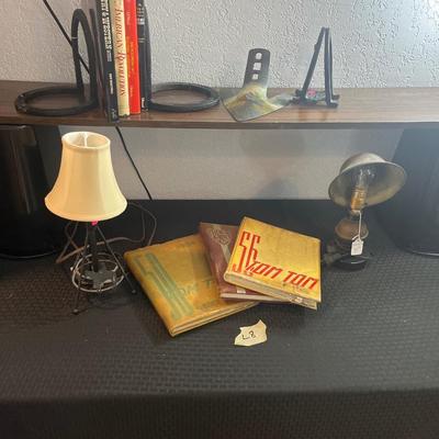 Sale Photo Thumbnail #281: Bookends, book, yearbooks, vintage lights
Table, trash cans and shelf do not sale