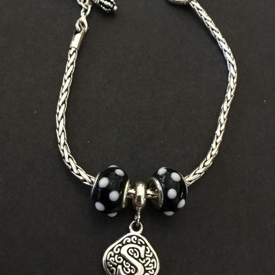 Very nice silvertone toggle bracelet, S charm