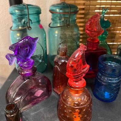 Sale Photo Thumbnail #295: Carved Birds and And animals 
vintage Jars and colorful jars.