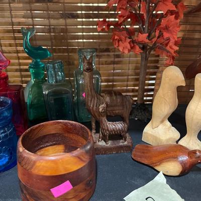 Sale Photo Thumbnail #294: Carved Birds and And animals 
vintage Jars and colorful jars.