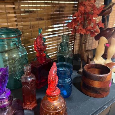 Sale Photo Thumbnail #292: Carved Birds and And animals 
vintage Jars and colorful jars.