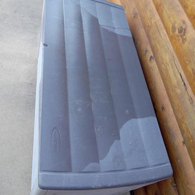 Vinyl storage box with patio cushions