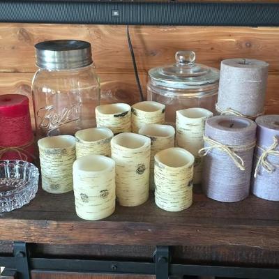 Assorted candles and jars