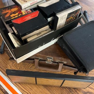 Sale Photo Thumbnail #362: Dvds, Cassettes, Dvds, cabinet and more.

Holders for CDs not included.