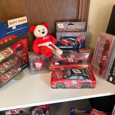 Sale Photo Thumbnail #415: Dale jr memorabilia 
Shelf and trash cans not for sale