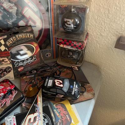 Sale Photo Thumbnail #427: Dale Earnhardt stuff
Shelf, trash cans and table not for sale