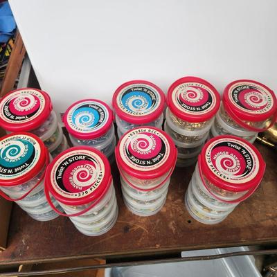 Lot of Twist N Store Containers Filled