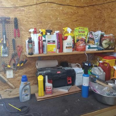 Lot of misc on bench.