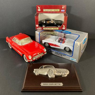LOT 131: Vintage Metal 53 Red Corvette, The National Corvette Museum Blue Flame 53 Print, 3 Dimensional Wall Plaque and Two Diecast...