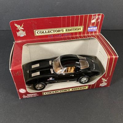 LOT 131: Vintage Metal 53 Red Corvette, The National Corvette Museum Blue Flame 53 Print, 3 Dimensional Wall Plaque and Two Diecast...