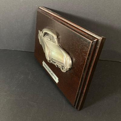 LOT 131: Vintage Metal 53 Red Corvette, The National Corvette Museum Blue Flame 53 Print, 3 Dimensional Wall Plaque and Two Diecast...