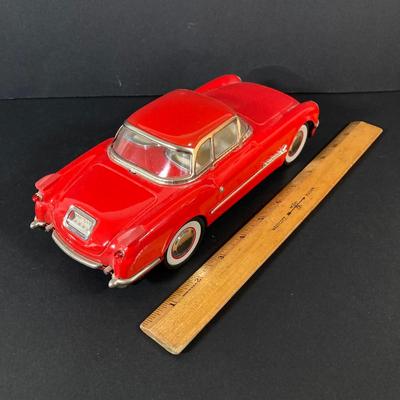 LOT 131: Vintage Metal 53 Red Corvette, The National Corvette Museum Blue Flame 53 Print, 3 Dimensional Wall Plaque and Two Diecast...