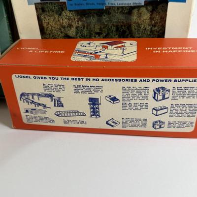 LOT 196: Vintage Minitures Including Building Trees, Gas Pumps and Toy Soldiers In Original Boxes