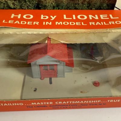 LOT 196: Vintage Minitures Including Building Trees, Gas Pumps and Toy Soldiers In Original Boxes