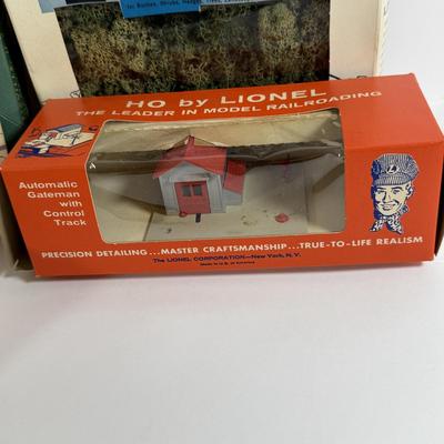 LOT 196: Vintage Minitures Including Building Trees, Gas Pumps and Toy Soldiers In Original Boxes