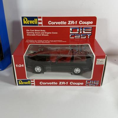 LOT 198 Set of Four (4): Hot Wheels Billionth Car Collection Corvettes, Two (2) Revell Die Cast Corvettes and Trading Cards