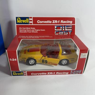LOT 198 Set of Four (4): Hot Wheels Billionth Car Collection Corvettes, Two (2) Revell Die Cast Corvettes and Trading Cards