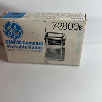 LOT 200: Vintage Electronics - GE 3-5002 Tape Recorder with Mic, Unopened GE AM/FM Compact Portable Radio 7-2800 and a Texas Instruments...