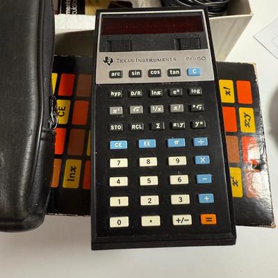LOT 200: Vintage Electronics - GE 3-5002 Tape Recorder with Mic, Unopened GE AM/FM Compact Portable Radio 7-2800 and a Texas Instruments...