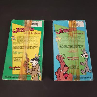 LOT 64: Sealed VHS Jetsons Collection & Space Jam with Collectors Coin