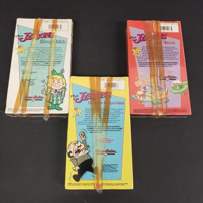 LOT 64: Sealed VHS Jetsons Collection & Space Jam with Collectors Coin