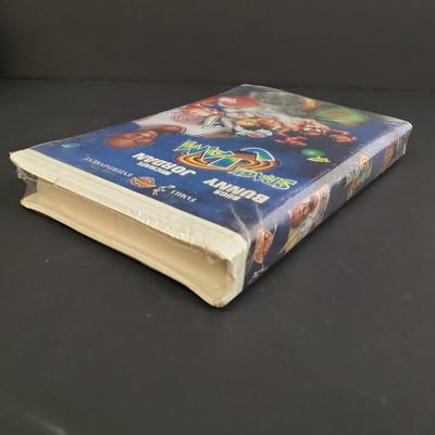 LOT 64: Sealed VHS Jetsons Collection & Space Jam with Collectors Coin