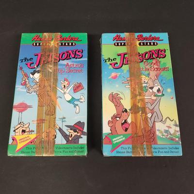 LOT 64: Sealed VHS Jetsons Collection & Space Jam with Collectors Coin
