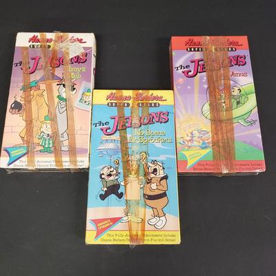 LOT 64: Sealed VHS Jetsons Collection & Space Jam with Collectors Coin