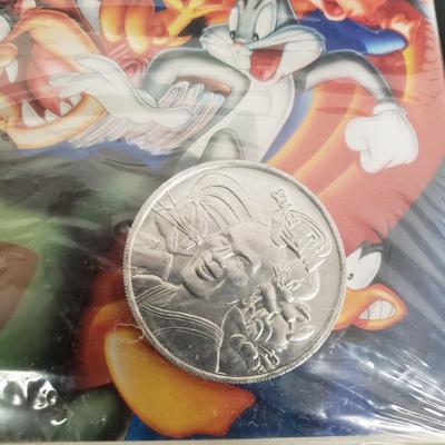 LOT 64: Sealed VHS Jetsons Collection & Space Jam with Collectors Coin
