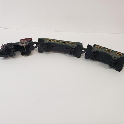 LOT 77: Vintage Cast Iron Train Set