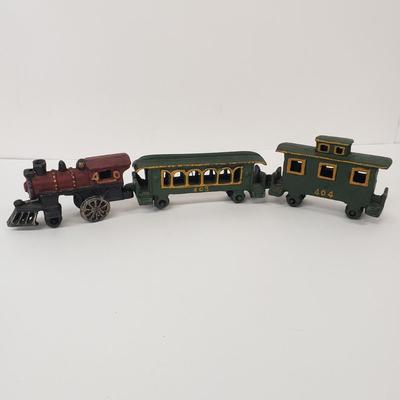 LOT 77: Vintage Cast Iron Train Set