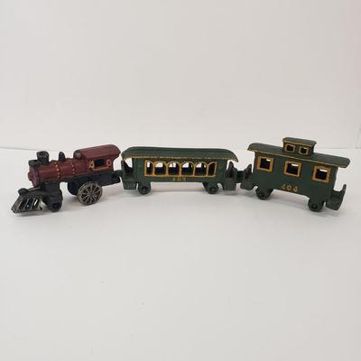 LOT 77: Vintage Cast Iron Train Set