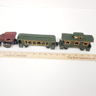 LOT 77: Vintage Cast Iron Train Set